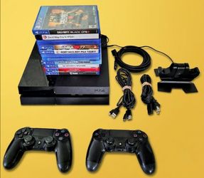 PlayStation 4 PS4 ,11 games and 2 controllers, 2 charging cords and charging cradle , power cable for console and HDMI cable