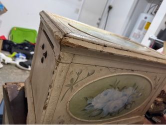 Antique chest with angel collectible inside