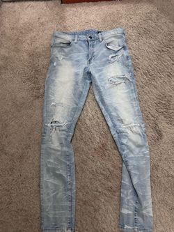Light Wash Distressed Skinny Jeans