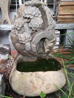 Waterfall fountain carved from granite