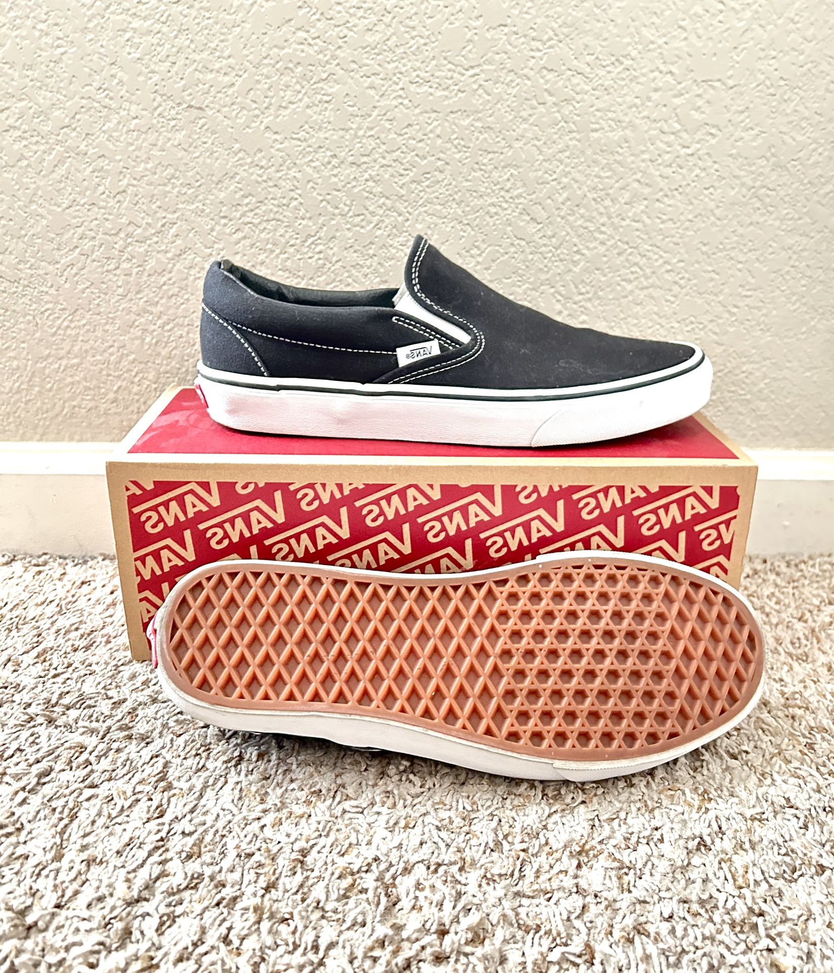 Vans Black Classic Slip-Ons