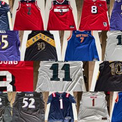 Variety Of NFL, NBA, And UMD Football And Basketball Jerseys 