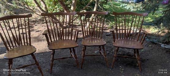Dinning Room Wooden Chairs Set Of 4.  2 Chairs are made with armrests.  They are intact and great condition and 2 are made without, great condition 
