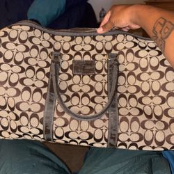 Women’s brown and tan canvas tote bag