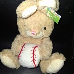 Easter bunny holding a baseball