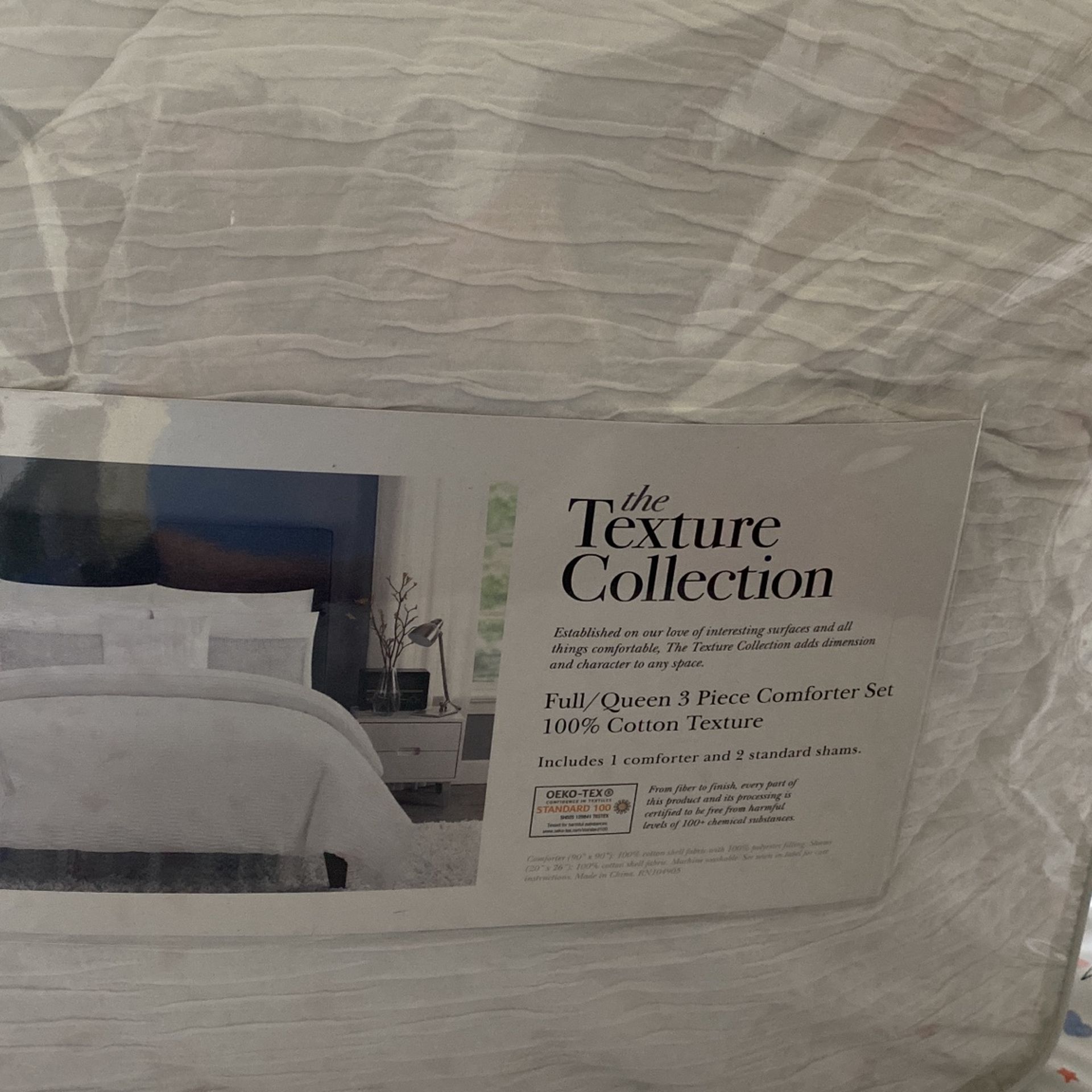 New Comforter In Plastic