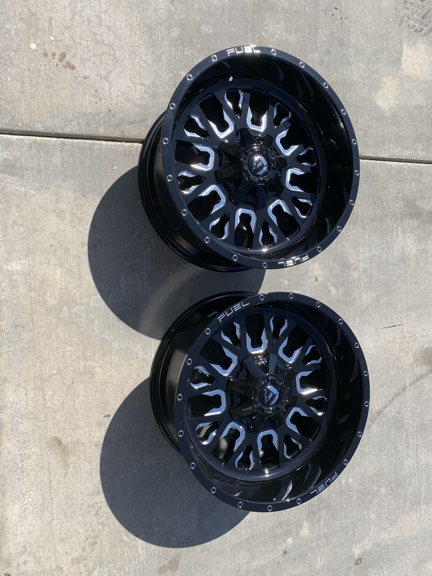 Two (2) Fuel D611 Stroke 20 x 10 Gloss Black Milled Off Road Rims