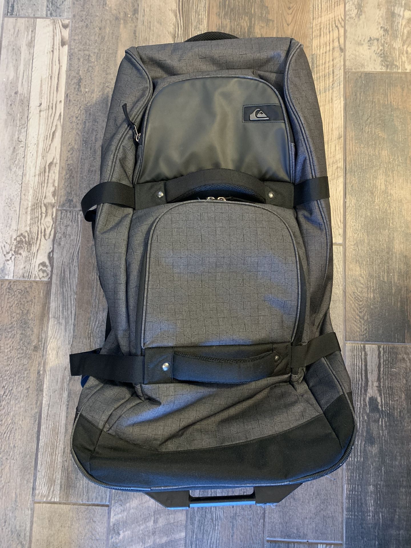 Quicksilver Luggage Bag. 32”high, 18”wide