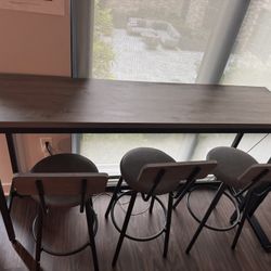 63’ High Table with 3 high chairs 