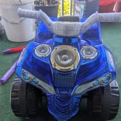 6 Volt Boys Pulse Quad Electric Ride-On Toy with Pulsating Speakers and Light-Up Handlebars