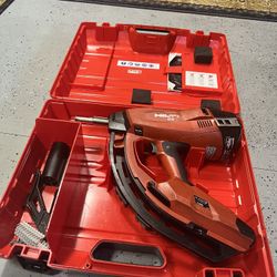 HILTI GX3 GAS ACTUATED FASTENING NAIL GUN.