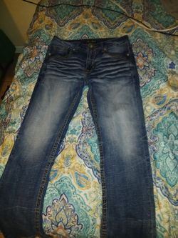 Boot cut salvage buckle jeans