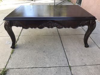 Coffee table.... Real wood, the weight will tell you itself. Long and in great conditions like new. It's only dusty