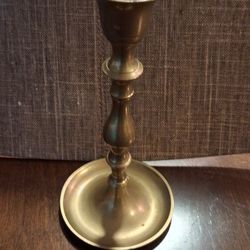 Single 8 1/2 inch high  candle stick. 
