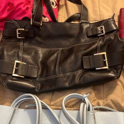 Handbags through Michael Kors broke gear and the black one is Michael Kors