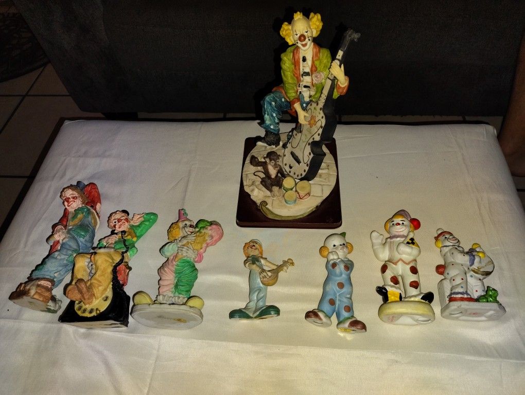 Antique Clown Figurine Collection
