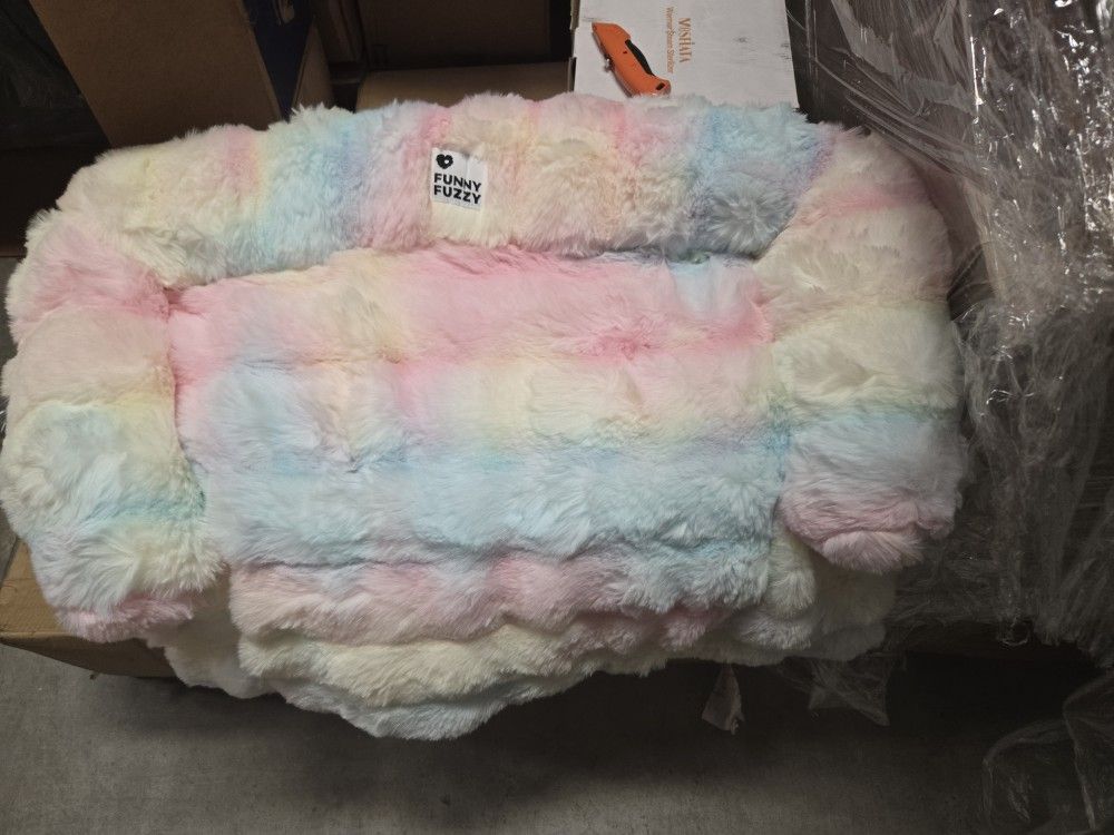 Various Sized Dog Beds And Couch Cover