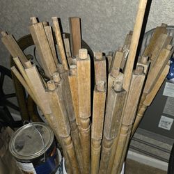 Bucket full of wooden ballisters