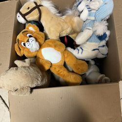 children’s books, stroller and stuffed animals