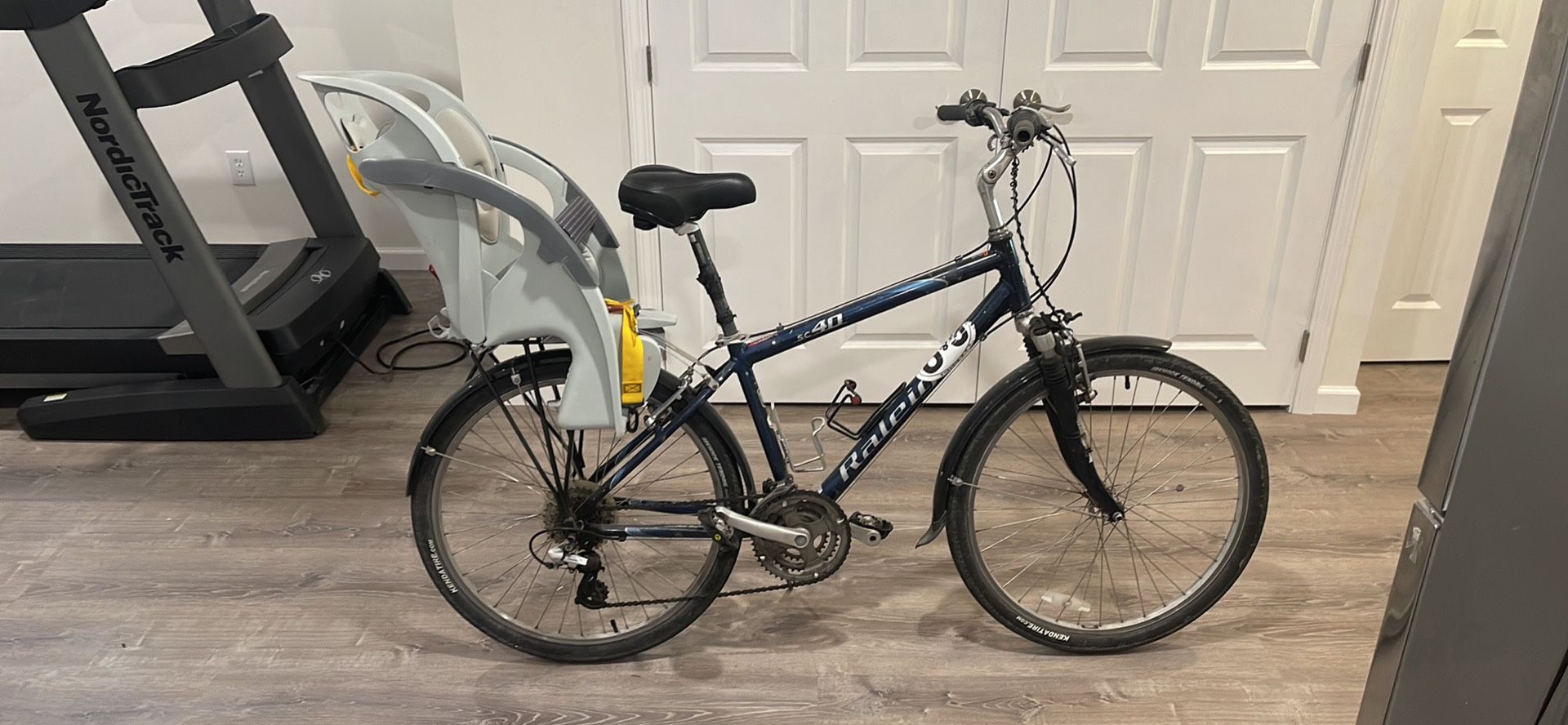 Raleigh sc40 used bike with lots of extras: rack, child seat, fenders, SPD clipless pedals