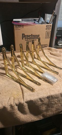 I HAVET 3 SETOF SHELF BRAKETS GOLD TONE 10"X8" IN THE STORE COST $140.00 FOR 1 SET N I SALE FOR$250