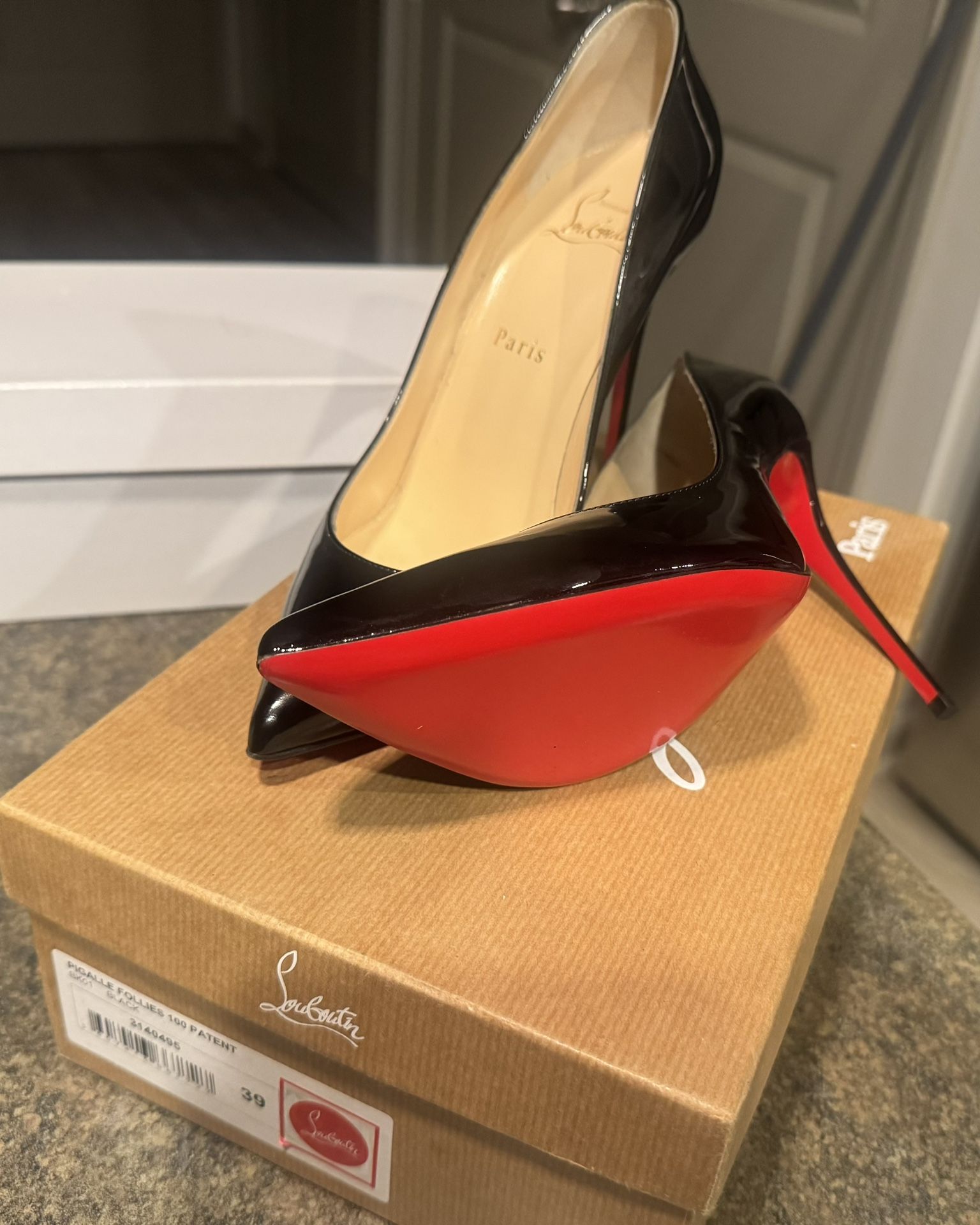 Christian Louboutin (red bottoms) Size