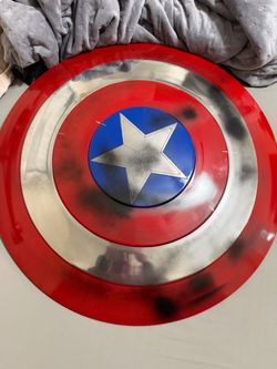 SHOOT ME AN OFFER Captain America Shield (metal) 24 inch (battle damaged )