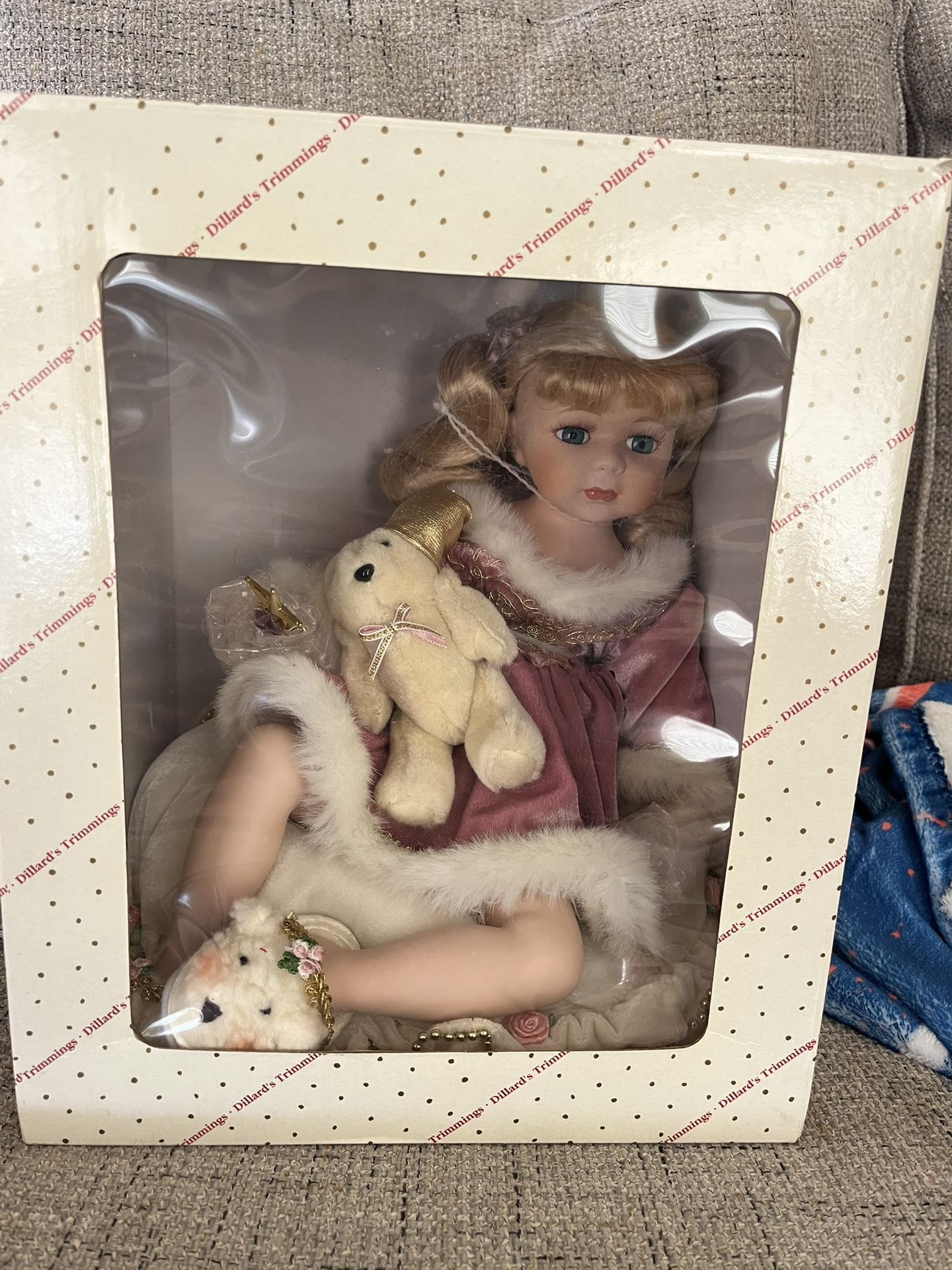 Dillard’s Trimming Porcelain Doll