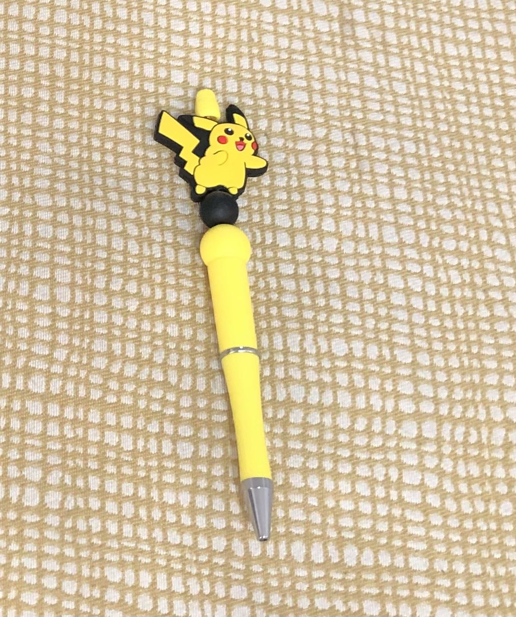 Pokémon pikashu beads pen. Color  yellow. Size 6”LX 1” W