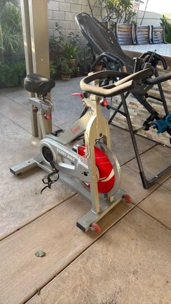 Free stationary spin bike and Fitspine inversion table. FREEE!!!