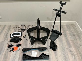Tacx Neo direct drive smart trainer with motion plates, tablet stand reader, front wheel holders and Zwift controls accessories