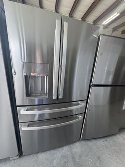Ge Profile Refrigerator With Some Dents 