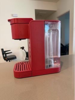 Red Keurig coffee maker
