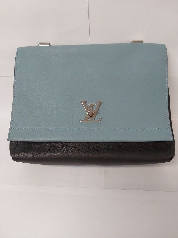 Louis Vuitton "Lock Me II" Bag