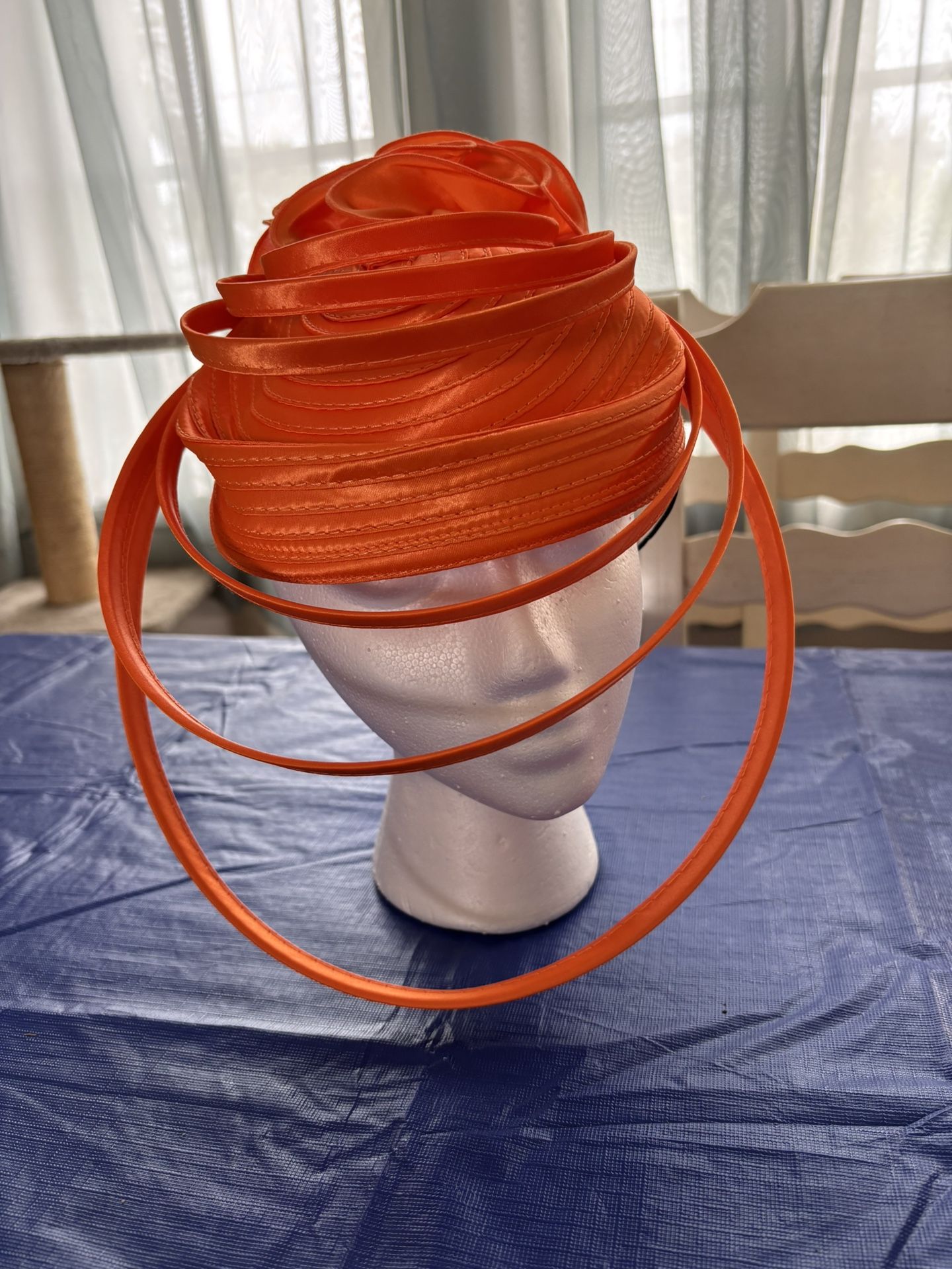 Unusual Orange Turban Style Hat With Rings