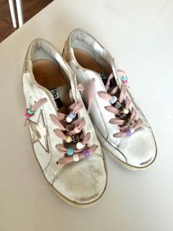 Golden Goose European shoe size 31 equals a US women's size US size 13.5 or 1 youth (little kid)