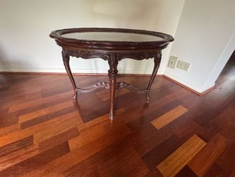 Wood carved glass top side table