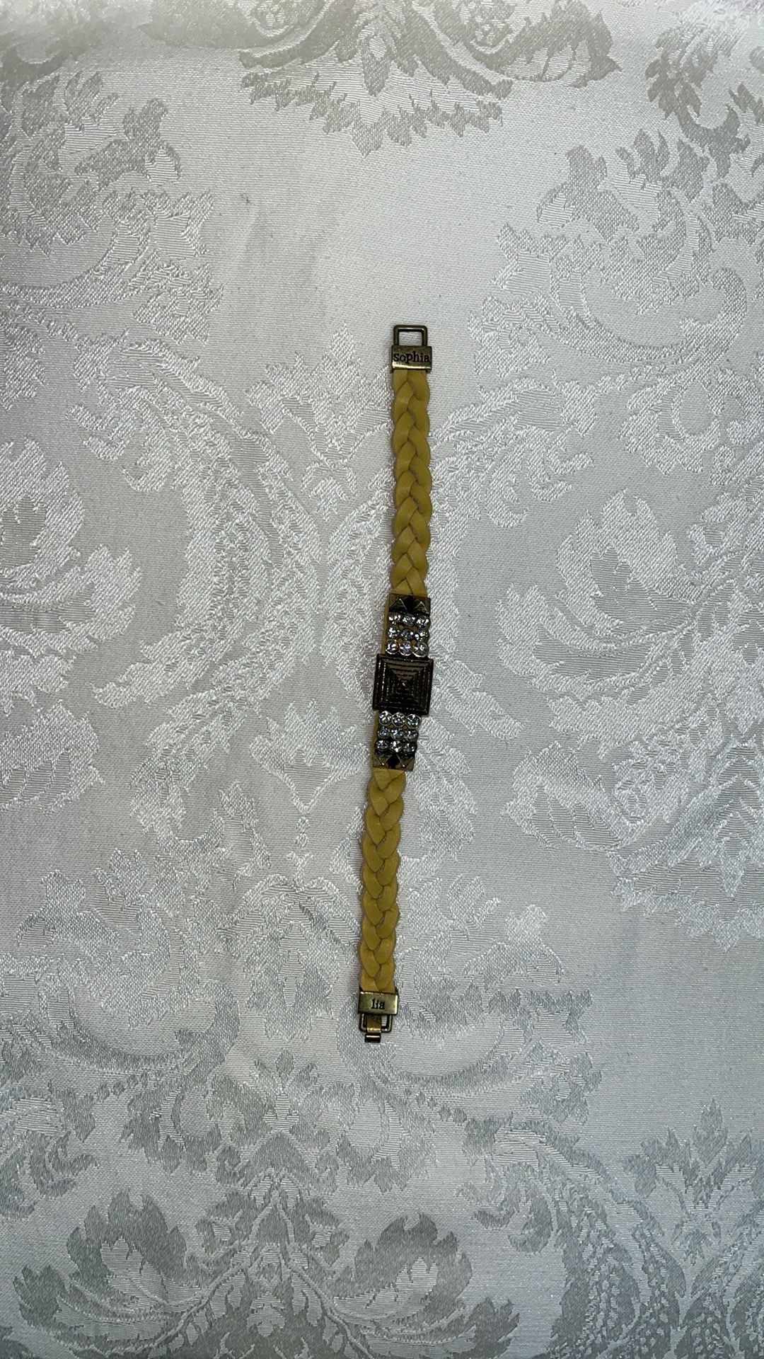 Lia Sophia yellow and gold tone leather braided bracelet