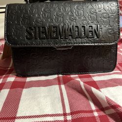 Black and silver Steve Madden crossbody bag