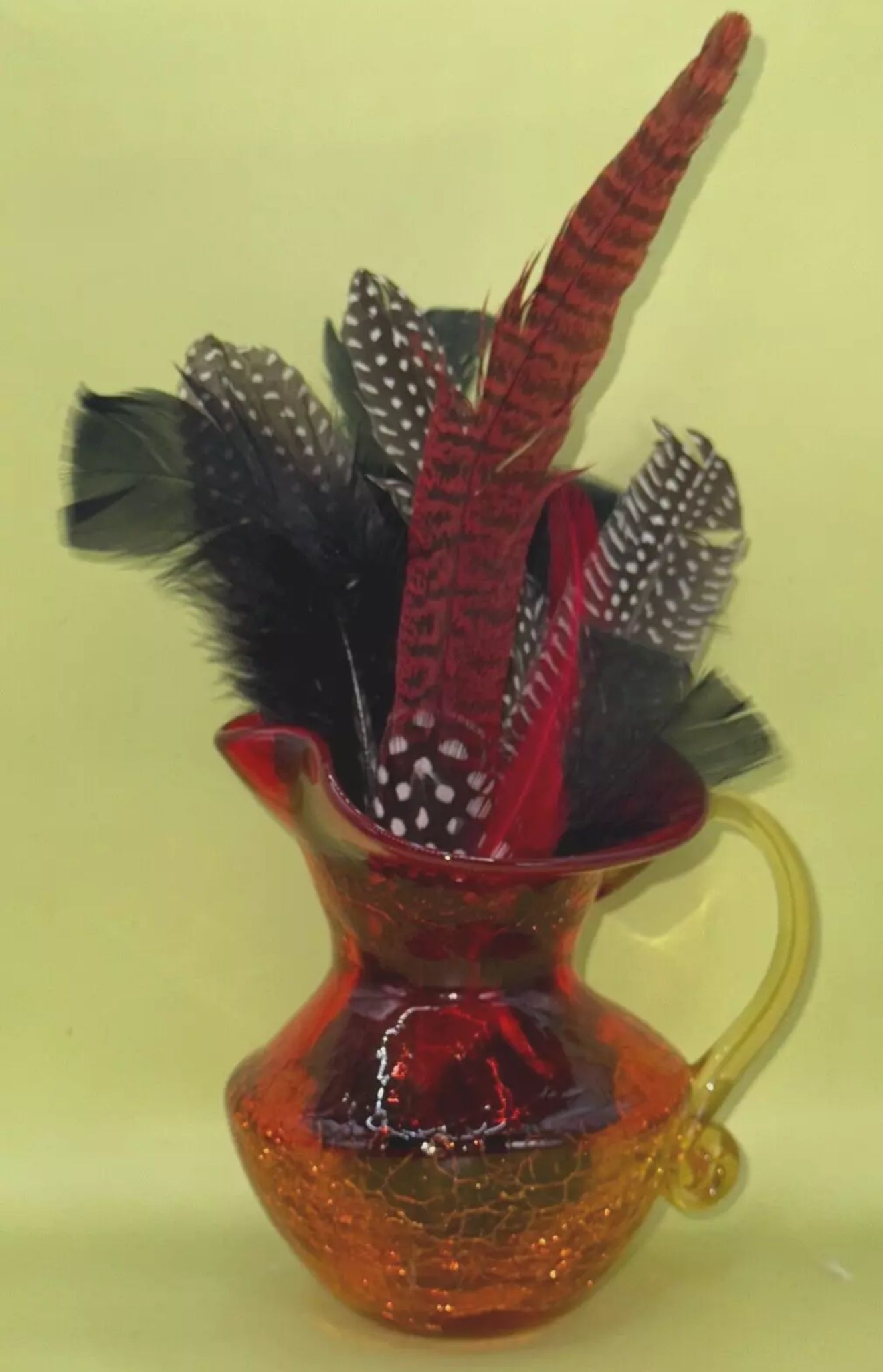 vintage 4.75" Miniature Pitcher is a hand-crafted piece of Amberina Crackle Glass