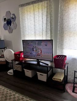 75” TV Stand w/ Charging Station & Drawers – Brown Industrial | $125 on Amazon