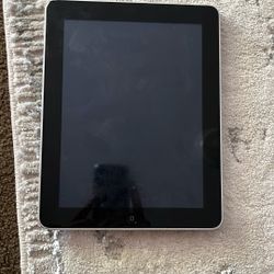 First generation iPad. Works Perfectly With Charger Included.  Has A Little Dent In One Corner 