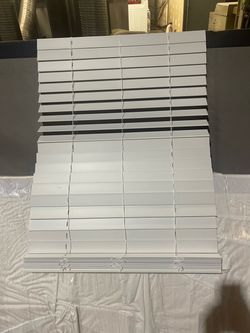 NEW IN THE BOX BLINDS.
