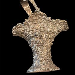 Repousse by Jenkins and Jenkins Sterling Silver Basket with Swing Handle (#25) Weight of 1lb 4 oz Sterling Silver. 8.5” tall & 9.25” length.