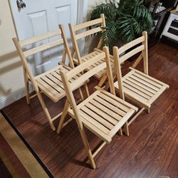 4 Wooden Foldable Chairs Very Good Condition 