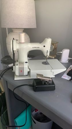 Antique Singer Sewing Machine with original case and owners manual