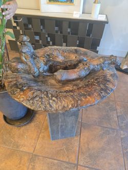 Bronze cattle crossing sculpture