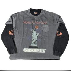 Stylish double-layered long sleeve shirt is size X Large and made of 100% cotton. This grey and black garment is from Bottega Desires and has a graphi