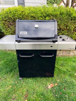 Weber spirit E–310 propane BBQ grill with brand new igniter and cover