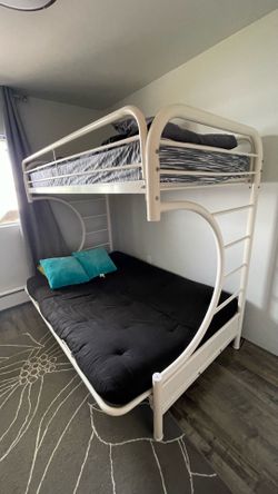 White bunk bed with futon couch